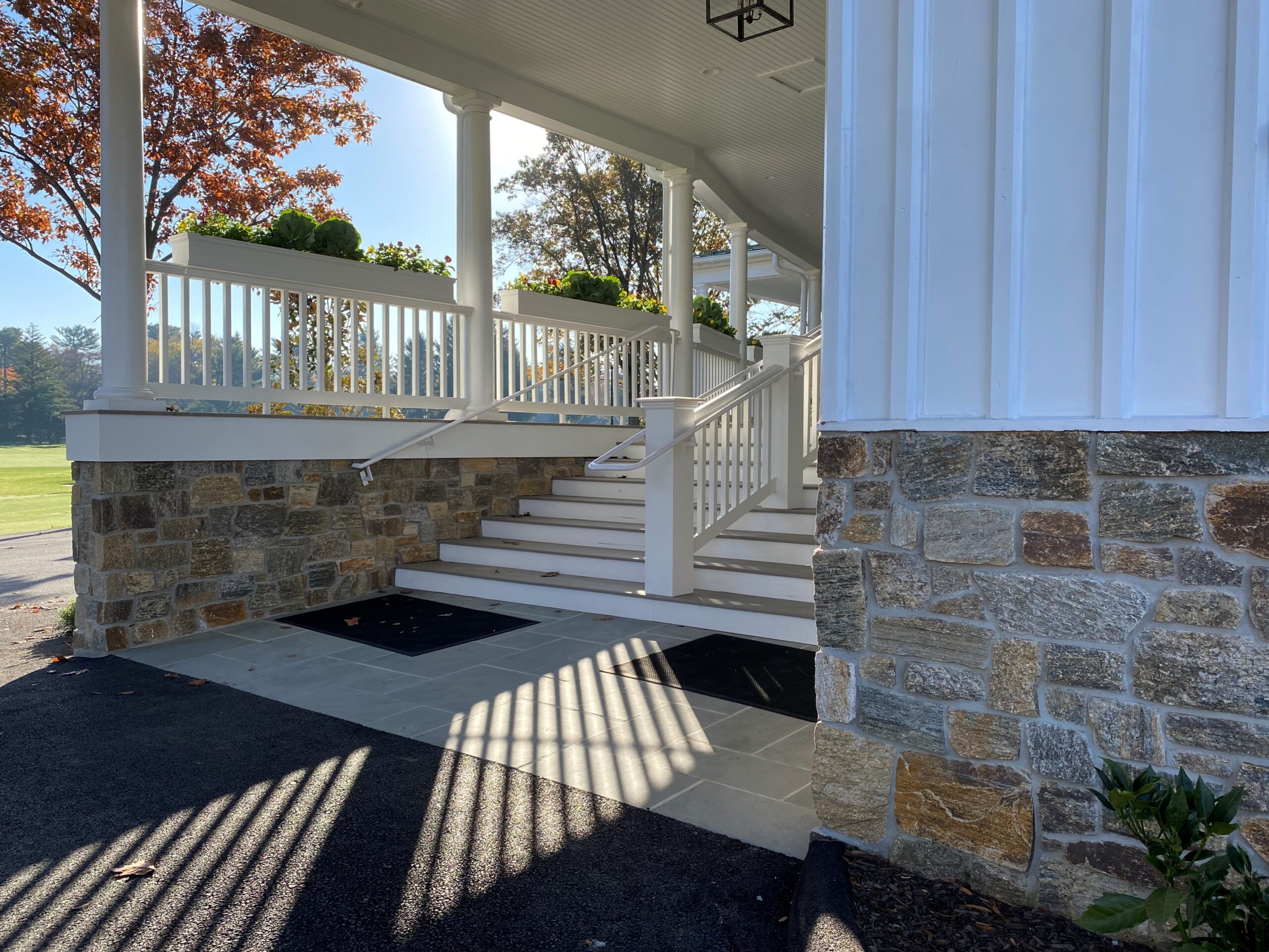 Natural Facing Ramone Brown Mosaic Natural Stone Veneer installed on commercial stairway