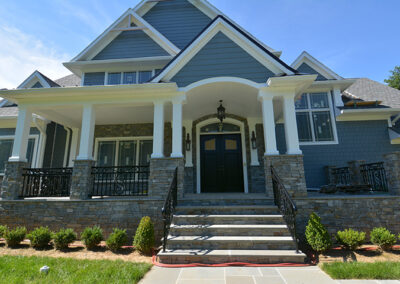 Natural Facing real stone veneer Ocean Blue Ledgestone blend installed on a home exterior