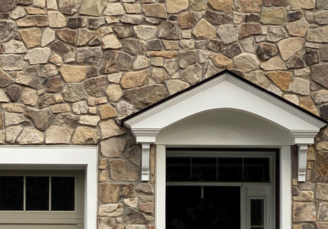 Home exterior with natural stone veneer