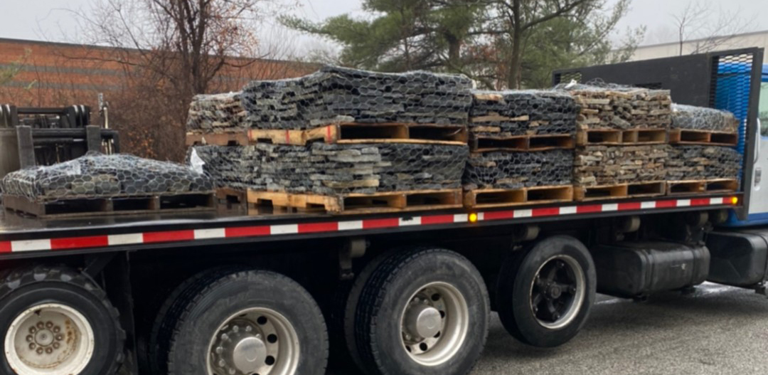 truck bed full of real stone veneer, sawn-thin stone delivery truck