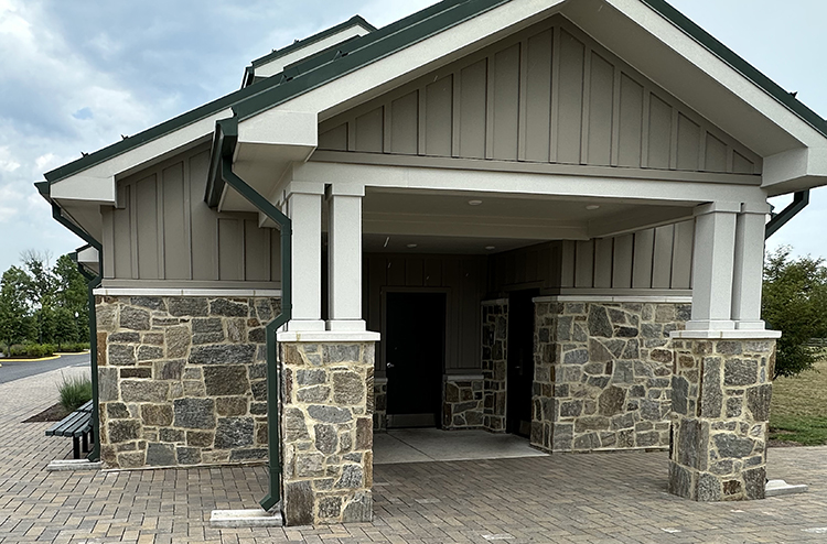 Front of public park restroom facility with Natural Facing Ramone Brown Mosaic real stone veneer