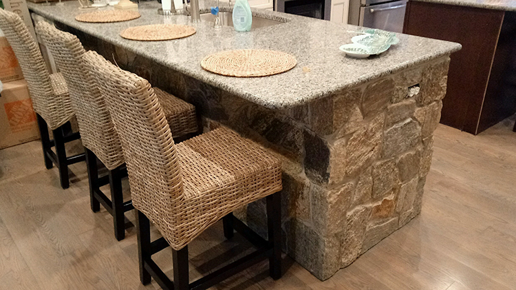 Natural Facing Ramone Brown stone veneer installed on a kitchen island